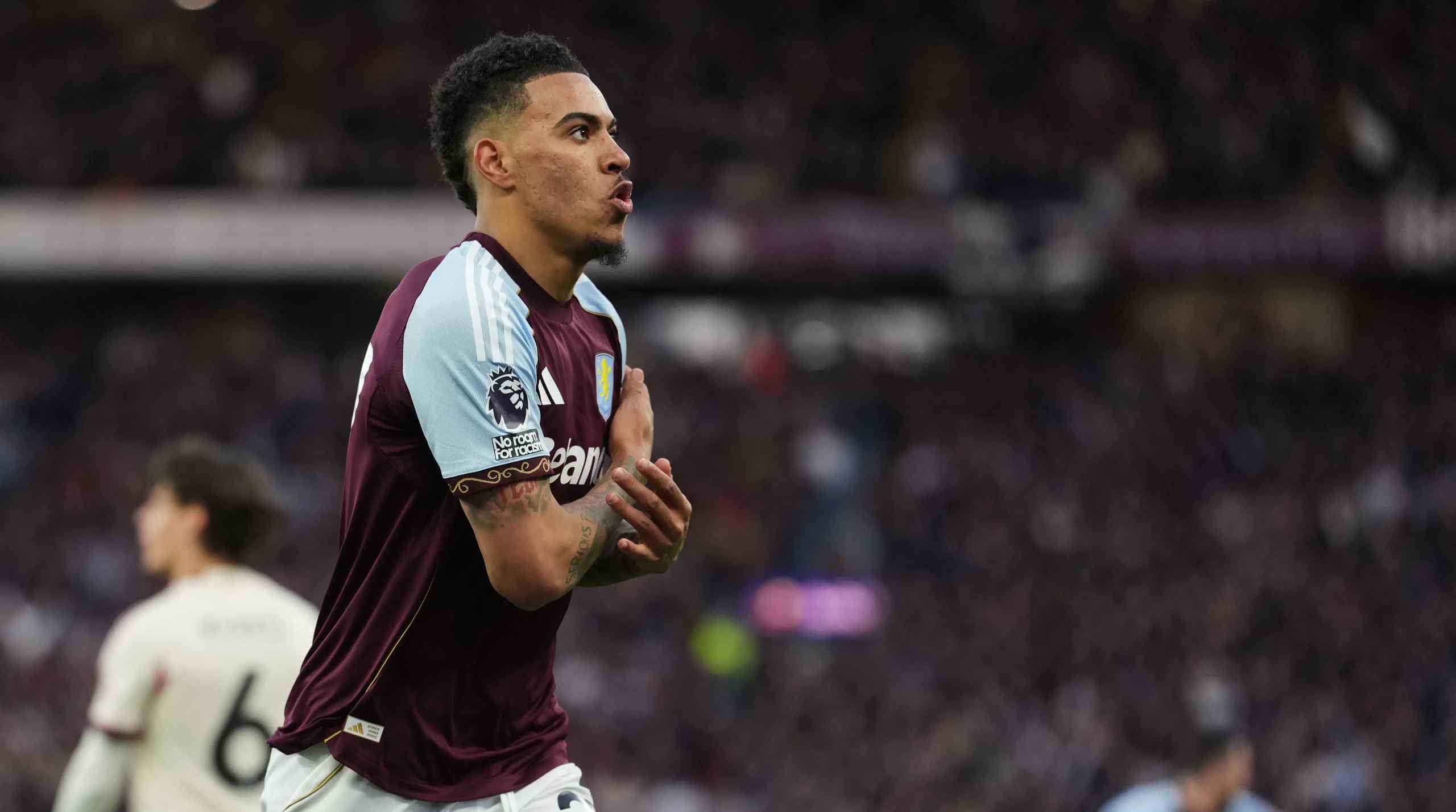 Aston Villa's Morgan Rogers celebrating a goal.